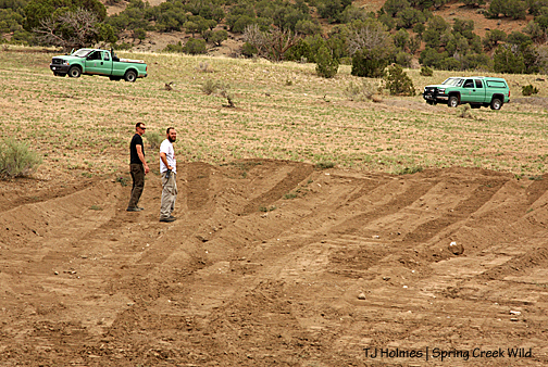Cody and John discussing the northwest pond.