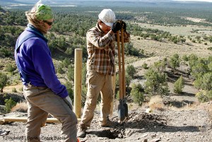 Southwest Conservation Corps members Eric and Aaron dig a hole while building an H-brace on the steep hill on Spring Creek Basin's southeastern boundary.