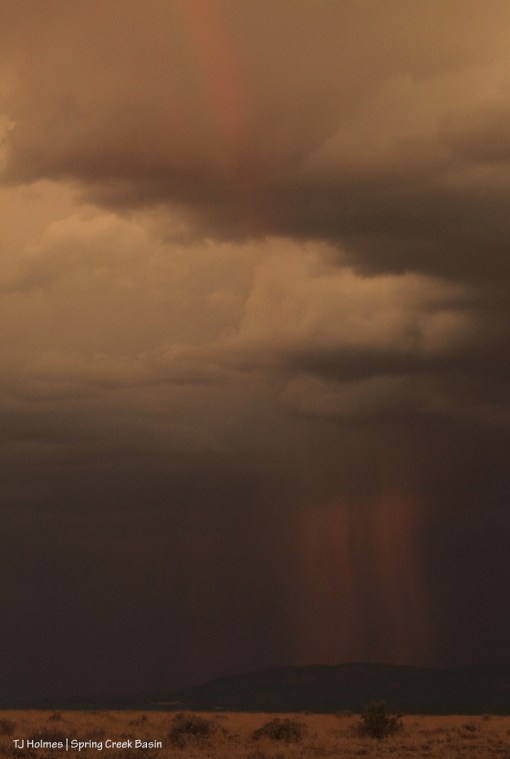 Rain and rainbow over Disappointment Valley.